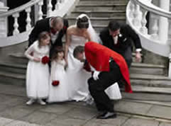 Essex Toastmaster Richard Palmer assisiting wedding photographer David Court at the Manor of Groves Golf and Country Club, Hertfordshire