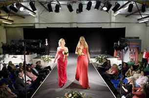 toastmaster Richard Palmer comparing a wedding fashion show with The English Toastmasters wedding fair trade stand