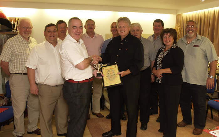 Toastmaster Roy Austin being presented with the Court Case Cup for his most excellent work with The English Toastmasters Association