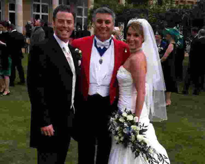 Toastmaster at Down Hall with a happy Bride and Groom