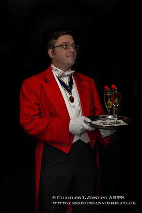 Hertfordshire and Essex Toastmaster and Master of the Ceremonies with a reception drink for the bride and groom