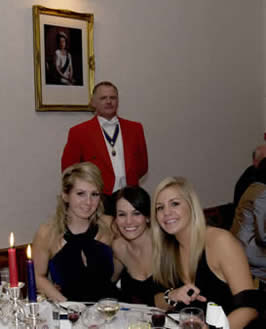 Her Majesty the Queen, keeping an eye on Toastmaster Jude Garland as he watches over the diners in the Officers Mess at Carver Barracks
