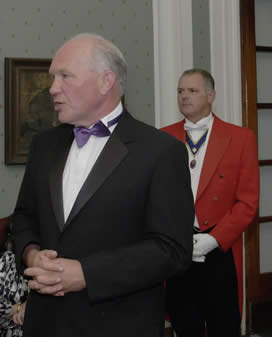 Chairman of the TTTA Moray Bayliss with Jude Garland Toastmaster and Master of Ceremonies