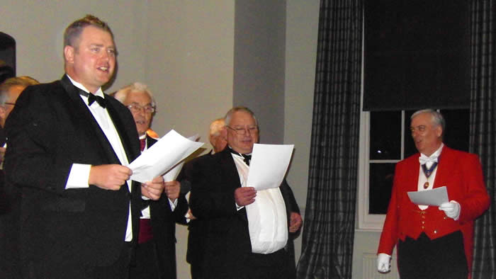 Masonic Ladies Festival toastmaster singing the Ladies Song with the brethren