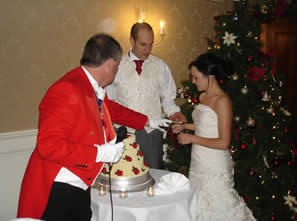 Kent toastmaster James Lark announces the cutting of the wedding cake 